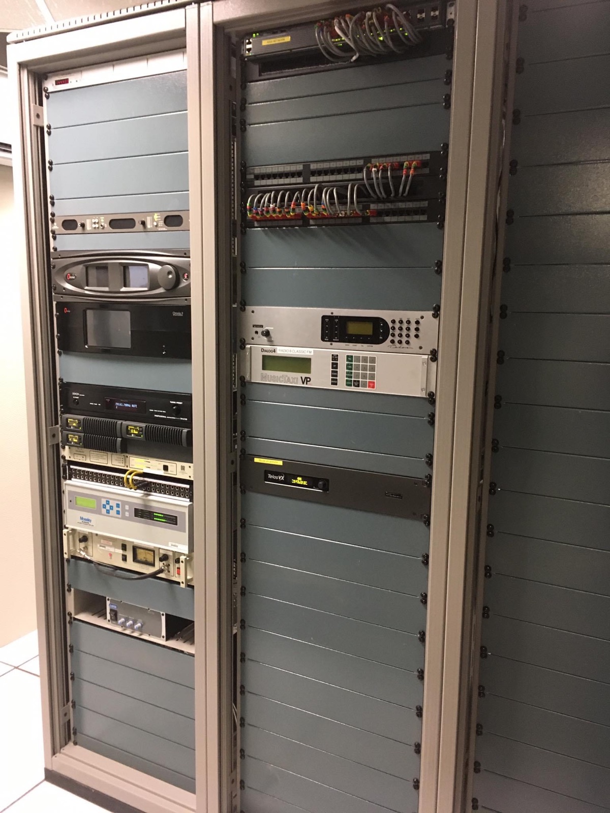 Broadcast equipment racks with processors, patching, and transmission hardware